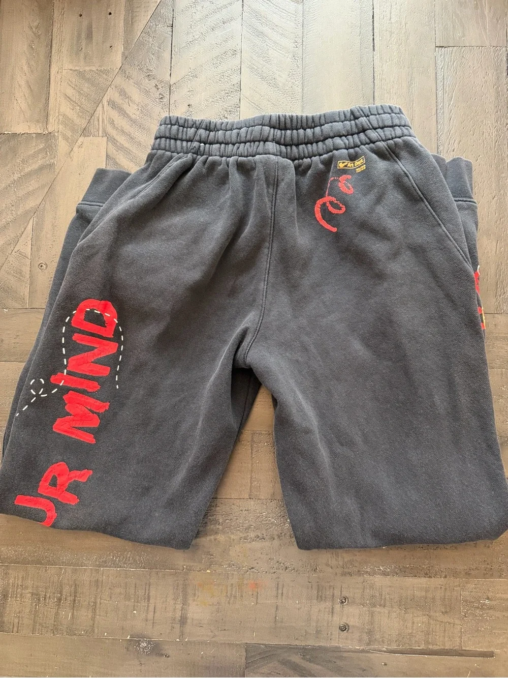 Nike Black Sweatpants with Red Drawstring and Graphics